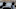 DENVER, CO – NOVEMBER 25: Jack Stewartson, left, general manager, and Kyle Glenn, owner, right, pose for a portrait beside an available car in their lot for Colorado Corvettes