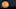 A person poses for a photo as the moon rises over Griffith Park in Los Angeles, California, on January 30, 2018.