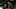 Shadow and Bone. (L to R) Jack Wolfe as Wylan, Kit Young as Jesper Fahey in episode 205 of Shadow and Bone. Cr. Timea Saghy/Netflix © 2022 Shadow and Bone. (L to R) Jack Wolfe as Wylan, Kit Young as Jesper Fahey in episode 205 of Shadow and Bone. Cr. Timea Saghy/Netflix © 2022