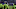 WIGAN, ENGLAND – FEBRUARY 19: Police hold back fans during a pitch invasion after the Emirates FA Cup Fifth Round match between Wigan Athletic and Manchester City at DW Stadium on February 19, 2018 in Wigan, England. (Photo by Gareth Copley/Getty Images)