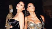Kim Kardashian calls Kylie Jenner's setting spray "cheap s**t' in YouTube video and Twitter loves it