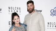 Jenelle Evans' estranged husband David Eason faces backlash for posting videos of dog cuddled up to daughter Ensley