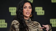 Kim Kardashian sparks criticism after she posts a PSA about social distancing.