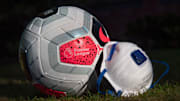 A Premier League Match Ball with a Protective Face Mask