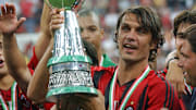 AC Milan captain Paolo Maldini (C) holds
