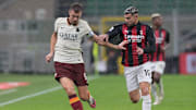 Un duello tra Dzeko e Theo Hernandez 