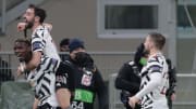 Paul Pogba celebrates with Bruno Fernandes