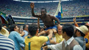 The legendary Pelé is chaired from the pitch as Brazil win the 1970 World Cup