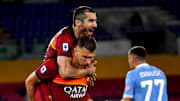 Henrikh Mkhitaryan abbraccia Edin Dzeko 