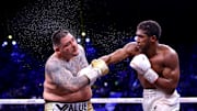 Los boxeadores; Andy Ruiz Jr y Anthony Joshua durante su combate por el título de pesos pesados