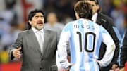 Argentina's coach Diego Maradona (L) loo