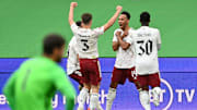 Arsenal celebrate their opening goal against Liverpool in the Community Shield.