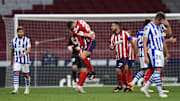 Los jugadores del Atlético de Madrid celebran un triunfo capital en su pelea por la liga
