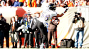 Baltimore Ravens' LJ Fort bobbles a ball against the Cleveland Browns.