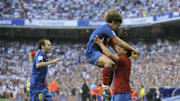 Barcelona's defender Carles Puyol (C) is