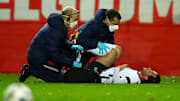 Ben Chilwell receives treatment for the injury against Belgium