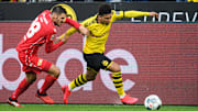 Hat gegen Jadon Sancho das Nachsehen: Christopher Trimmel (l.)