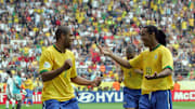 Brazilian forward Adriano (L) celebratin