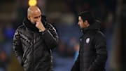 Pep Guardiola (kiri) dan Mikel Arteta (kanan) / Manchester City