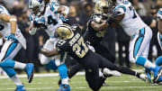 New Orleans Saints DB Malcolm Jenkins dives for a tackle.