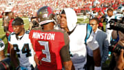Jameis Winston and Cam Newton shake hands after the Tampa Bay Buccaneers, Carolina Panthers game