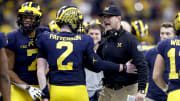 Jim Harbaugh and Shea Patterson