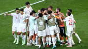 Spain celebrate their stunning victory over Croatia
