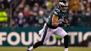 Zach Ertz catches and runs with the ball against the Dallas Cowboys