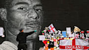 Defaced Mural Of Marcus Rashford Repaired By The Artist In Manchester