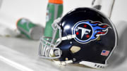 A Titans fan threatened to kill barbershop employees following team's AFC Title loss.