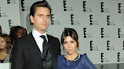 Scott Disick flirts with Kourtney Kardashian on Instagram, reigniting romance rumors.