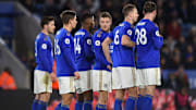 Leicester players prepare to defend a set piece