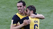 Diego Godín y Koke