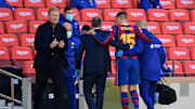 Lenglet is helped from the field