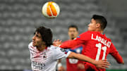 Araujo et Tonali en duel lors du match Milan-Lille. 