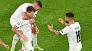 L'Italia esulta dopo il gol di Barella al Belgio 