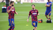 Gerard Pique (l.) und Lionel Messi (r.) beim Training