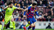 Messi perseguido por varios jugadores del Getafe durante la pasada temporada