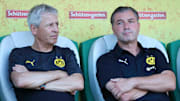 Auch für Trainer Favre (l.) und Sportchef Zorc (r.) dürfte die finanzielle Lage weniger schmackhaft sein