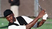 Former Chicago Bulls player Michael Jordan gets in