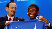 Freddy Adu (R), a 14-year-old soccer pro