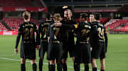 Barcelona players celebrate Antoine Griezmann's second 