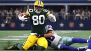 Green Bay Packers tight end Jimmy Graham getting tackled against the Dallas Cowboys