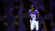 Vikings cornerback Xavier Rhodes jogs out of the tunnel as he's announced in the starting lineup against the Packers.