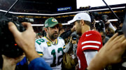 Aaron Rodgers and Jimmy Garoppolo meet post-game following San Francisco's Week 12 win.