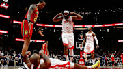 James Harden flexes over PJ Tucker.