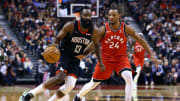 James Harden drives as the Houston Rockets take on the Toronto Raptors.