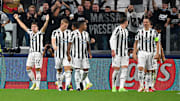 Federico Chiesa (left) and his teammates celebrate the opening goal against Chelsea