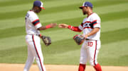 Chicago White Sox infielders Tim Anderson and Yoan Moncada.