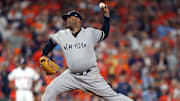 CC Sabathia winds up a pitch for the New York Yankees in playoff game.